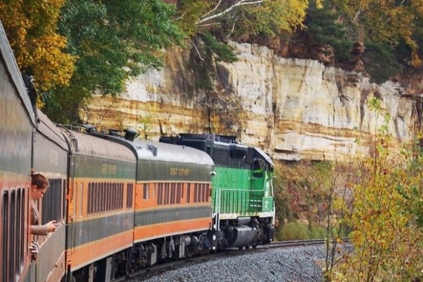 a large long train on a steel track